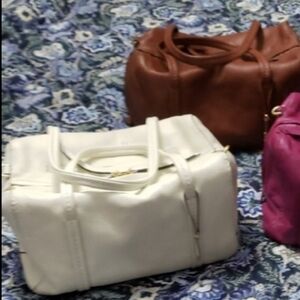 Two Vera Bradley Leather Mallory Bags, Cream White and Cognac Brown.